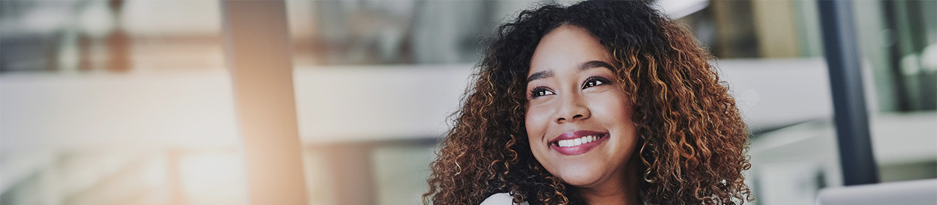 woman smiling in office setting