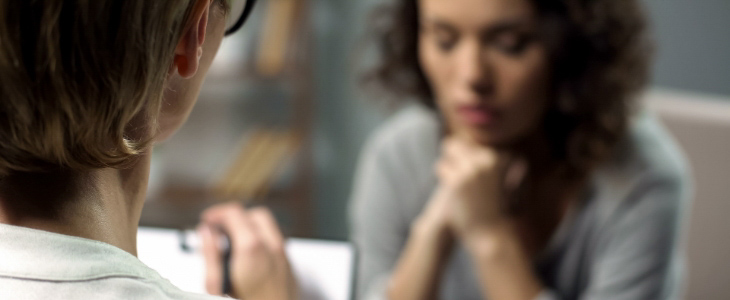 counselor talking to patient